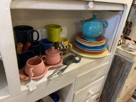fiesta ware tea pot, salad plates, cream & sugar, coffee mugs