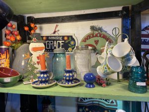 A Fresh Booth Refresh & a Touch of Mid‑Century Cheer - snowman standup, polish pottery candle holders, and mid-century coffee mugs