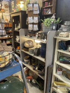 Why Handmade and Vintage Belong Together - vintage booth with vintage hand handmade signs, keychaings & magnets