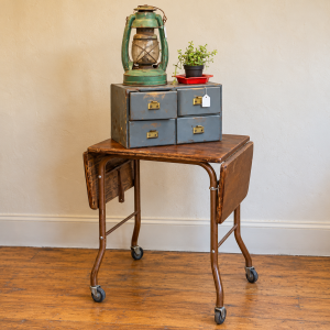 A New Booth, A Lot of Possibilities, Wood & Metal Typewritter table, Wood ammo box, old green lantern & a Coors ashtray